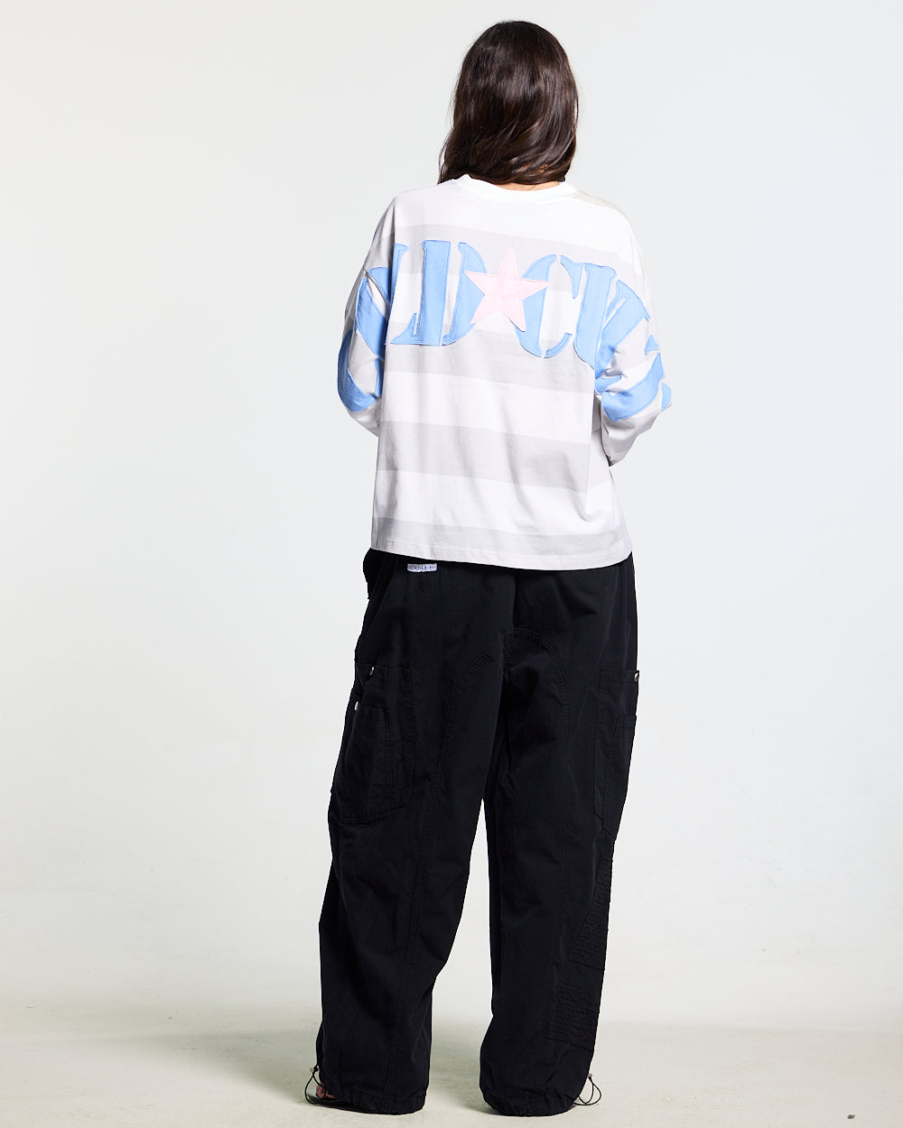 NORTH STARS LONGSLEEVE WHITE - white striped longsleeve tee, back view on female model - Cold Culture #woman