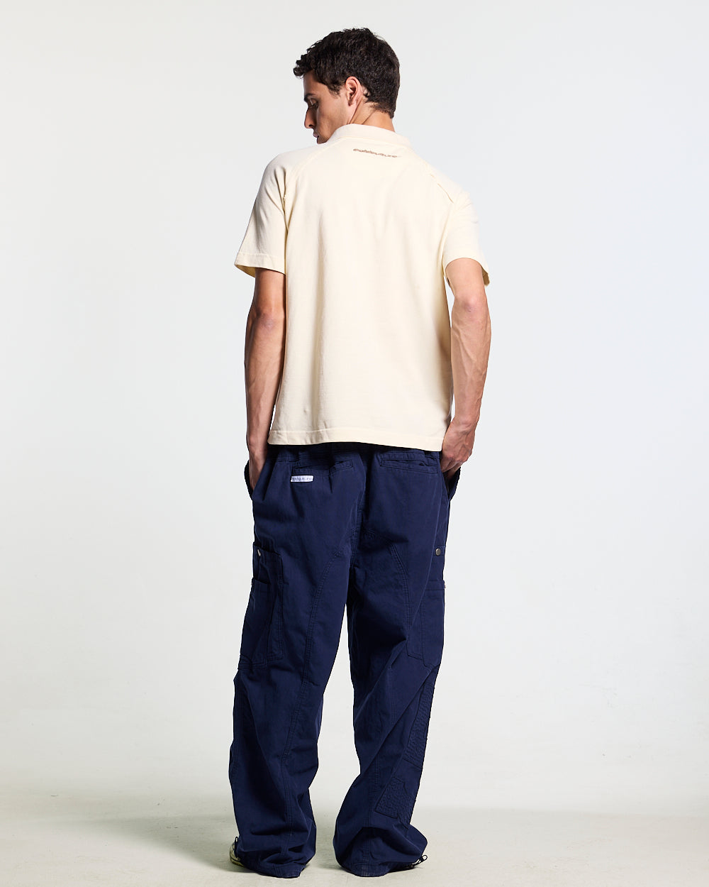 GOTHIC DISTRESSED POLO BEIGE - beige gothic print polo shirt, back view on male model - Cold Culture #man