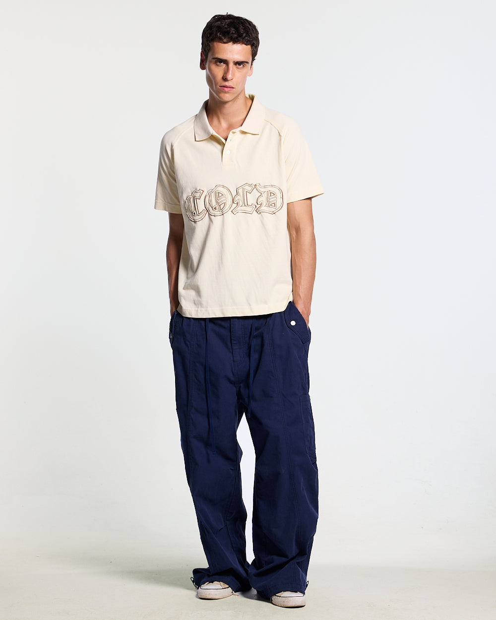 GOTHIC DISTRESSED POLO BEIGE - beige gothic print polo shirt, front view on male model - Cold Culture #man