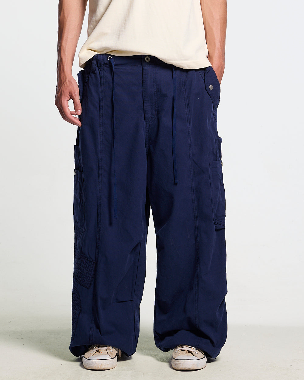 SOLID CARGO PANTS NAVY - navy cargo pants, front view on male model - Cold Culture