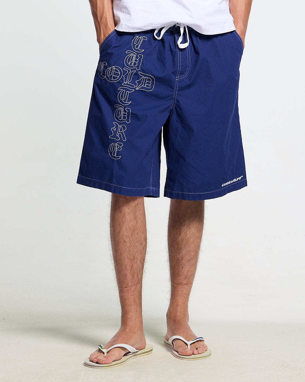 CROSSED SWIMSHORTS BLUE - navy gothic print swim shorts, worn detail - Cold Culture
