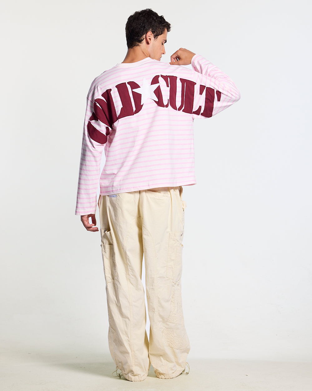 NORTH STARS LONGSLEEVE PINK - pink striped longsleeve tee, back view on male model - Cold Culture #man