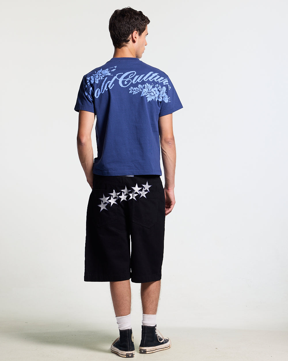 BLOOM TEE NAVY - navy floral print tee, back view on male model - Cold Culture #man