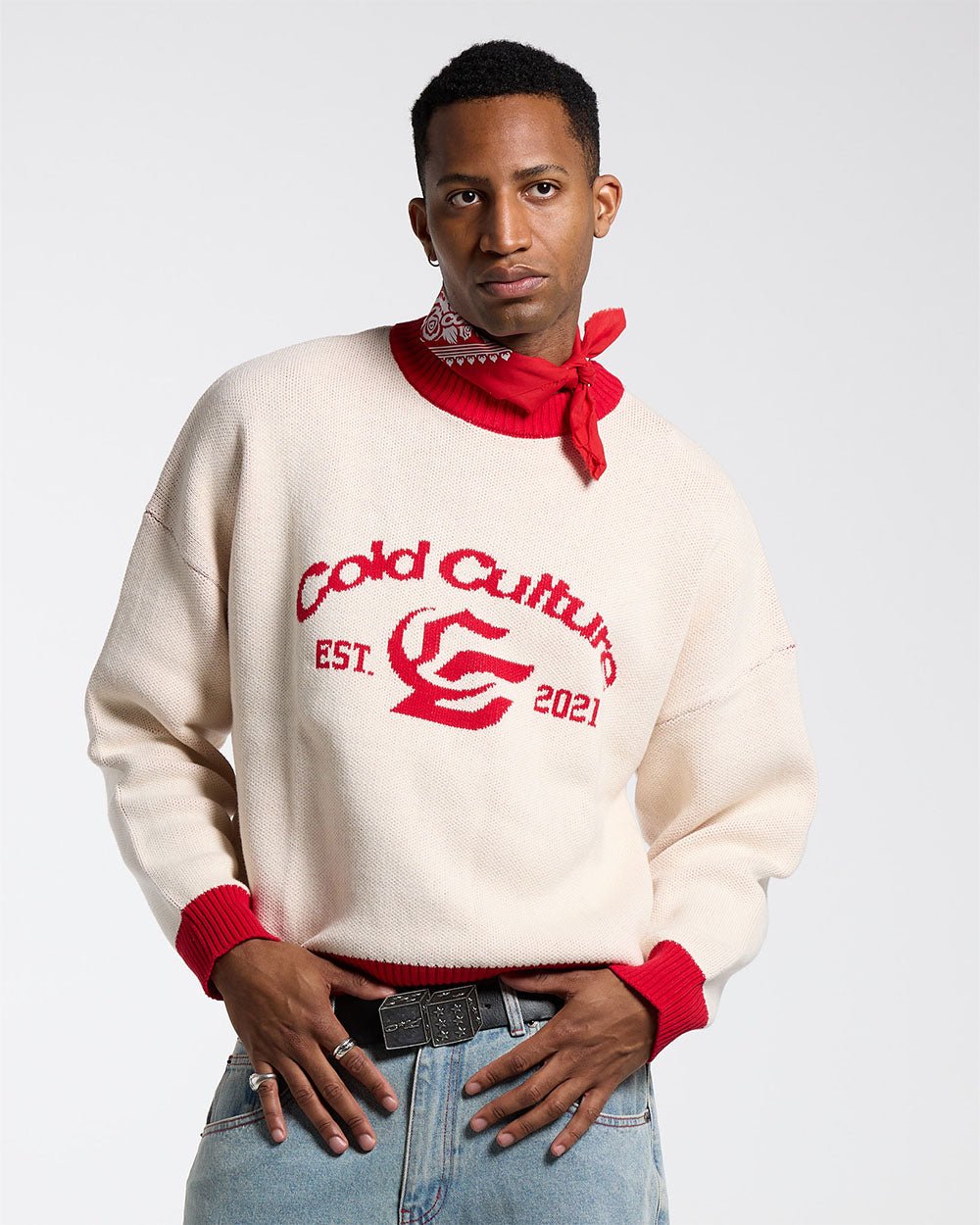 ACADEMY KNIT ACID WHITE - cream knit sweater with red trim, front view on male model - Cold Culture #man