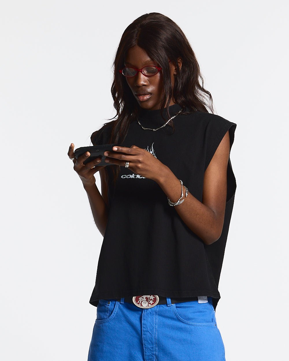 ACID BLACK BOXY TANK - black boxy sleeveless tee, front view on female model - Cold Culture #woman