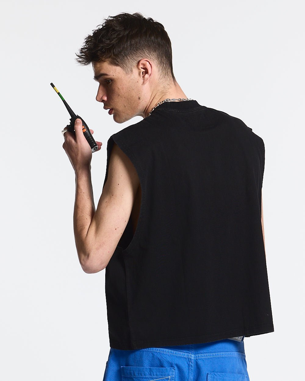 ACID BLACK BOXY TANK - black boxy sleeveless tee, back view on male model - Cold Culture #man