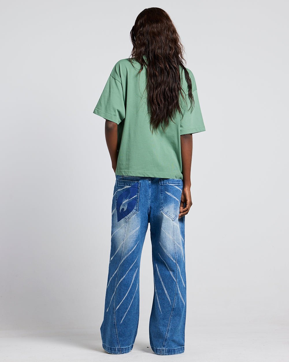 ADVENTURES TEE GREEN & YELLOW - green graphic print tee, back view on female model - Cold Culture #woman
