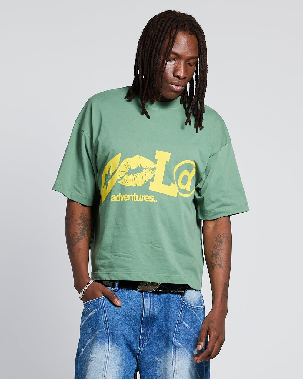 ADVENTURES TEE GREEN & YELLOW - green graphic print tee, front view on male model - Cold Culture #man
