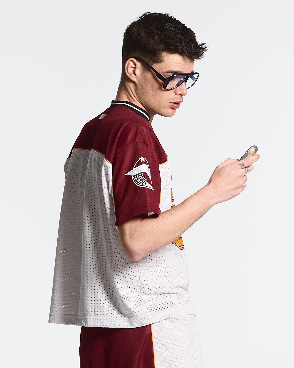 AERO STEED TEE CREAM/BURGUNDY - cream and burgundy mesh jersey tee, side view - Cold Culture #man