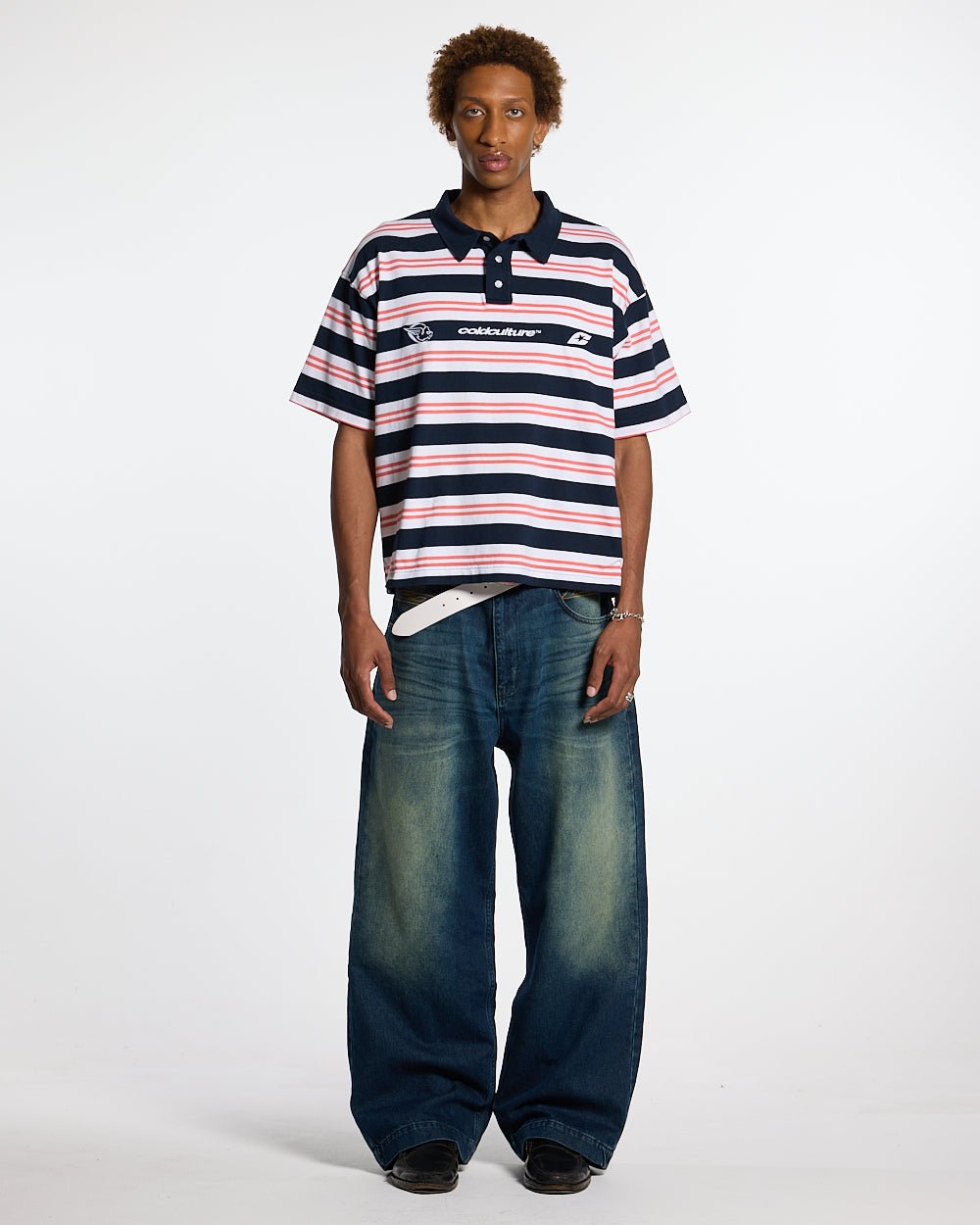AEROSTRIPES POLO BLUE SEA/CORAL - navy and coral striped polo shirt, front view on male model - Cold Culture #man