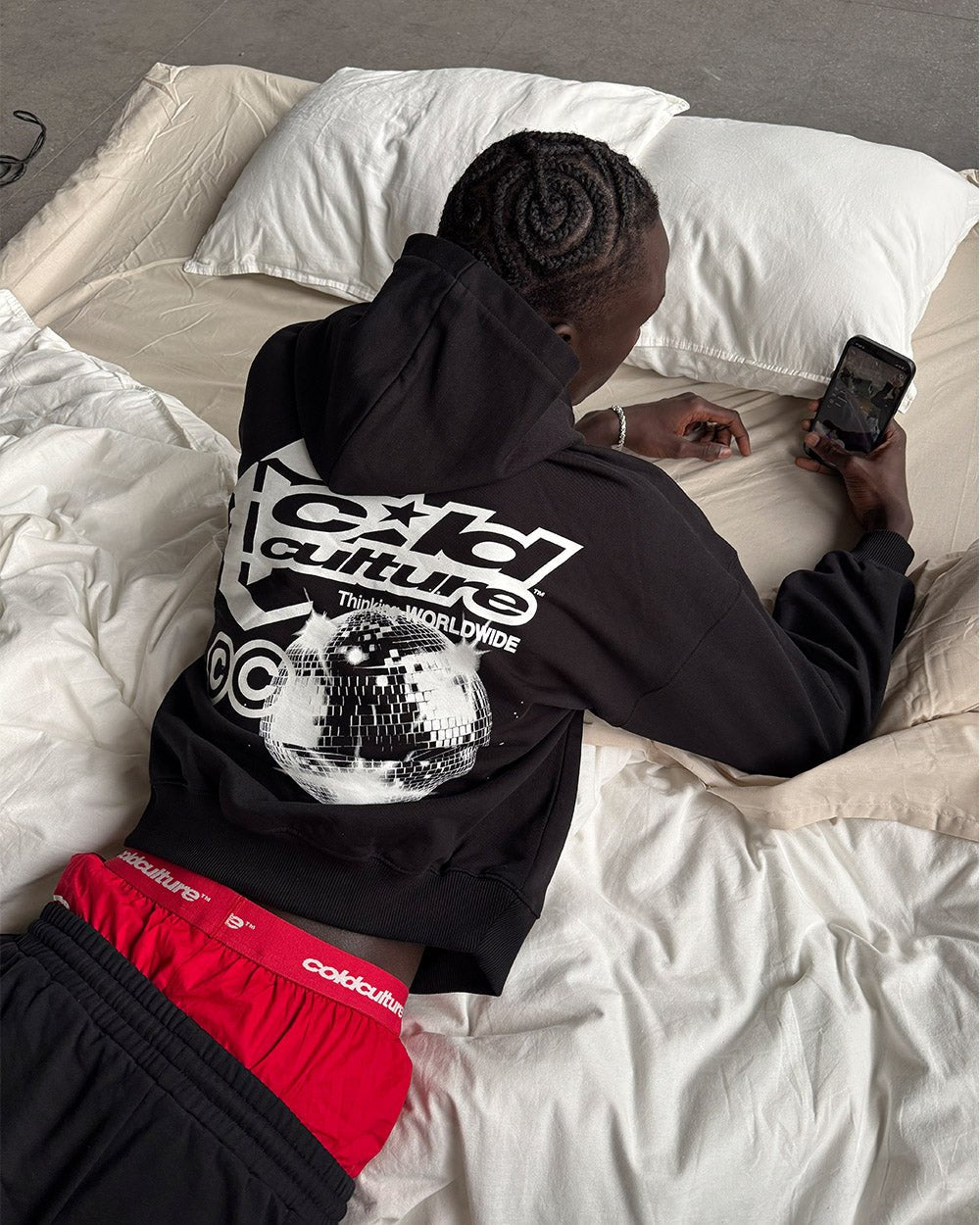 AFTER DARK HOODIE BLACK - black graphic print hoodie, street style shot - Cold Culture