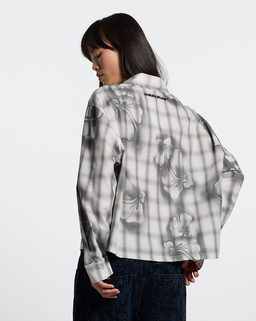 ALOHA SHIRT GREY - grey floral print long sleeve shirt, back view on female model - Cold Culture #woman
