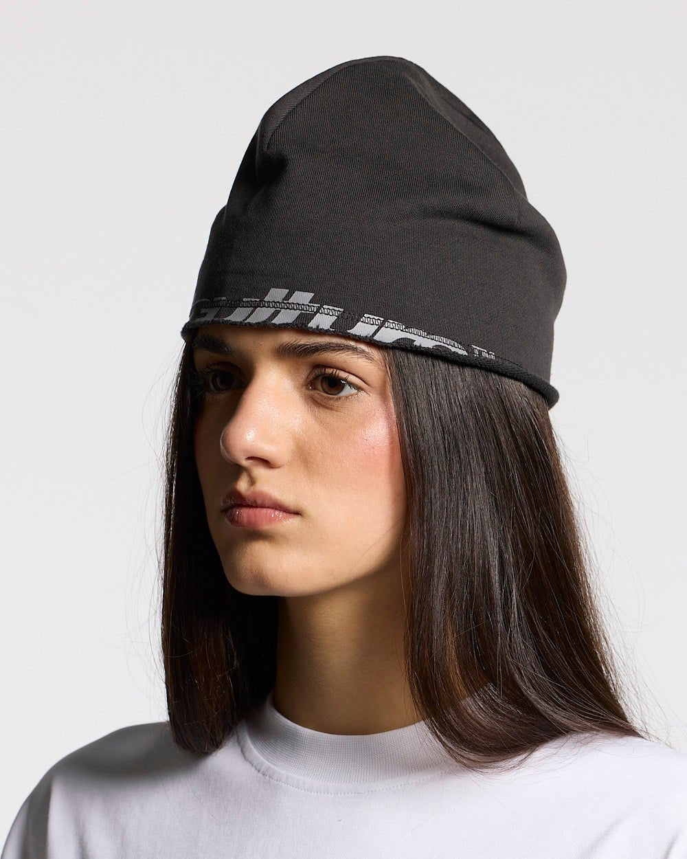 ARMOUR BEANIE BLACK - black logo beanie, on model close-up - Cold Culture #woman