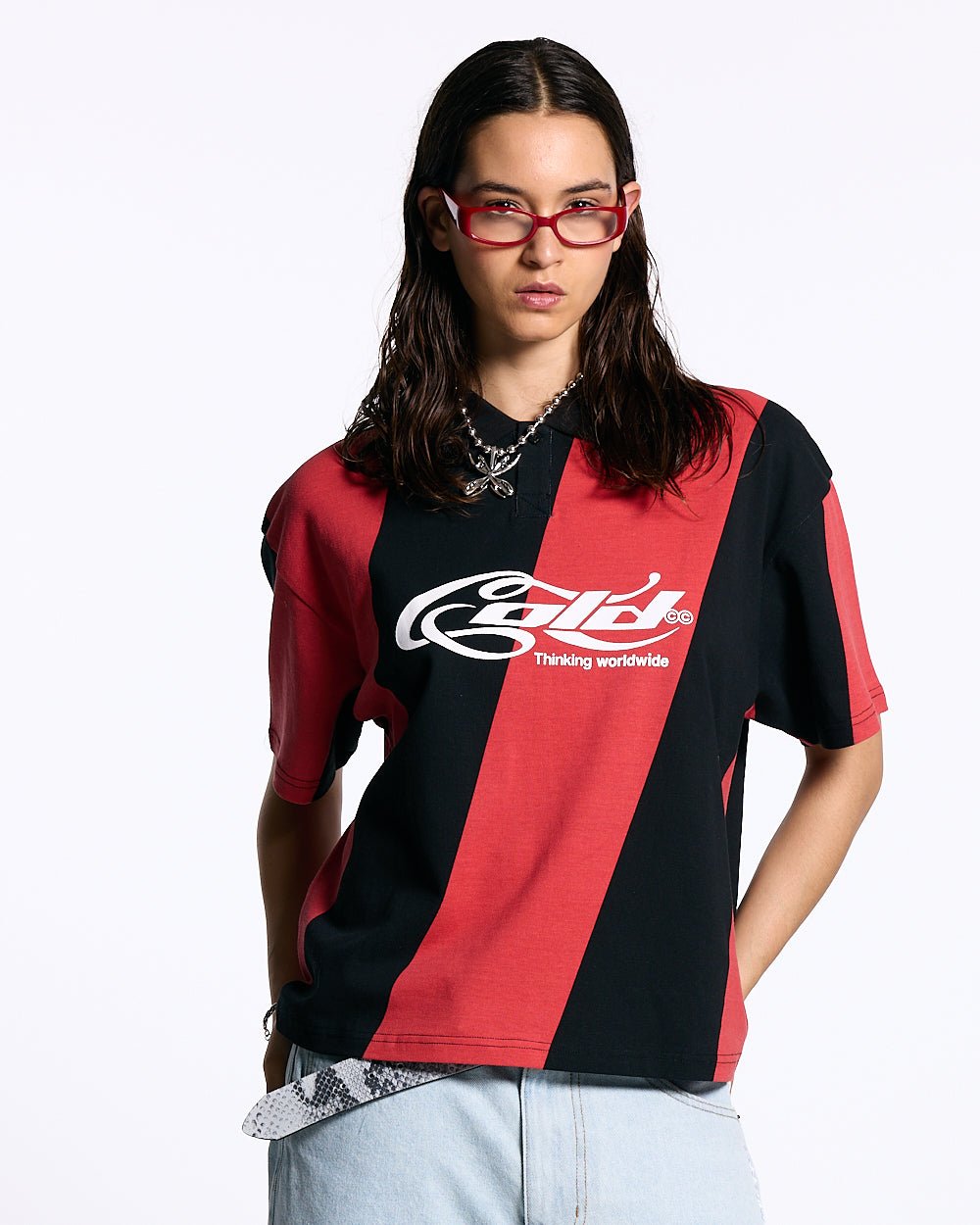 ASLANT STRIPES POLO TEE BLACK AND RED - red and black striped polo shirt, front view on female model - Cold Culture #woman