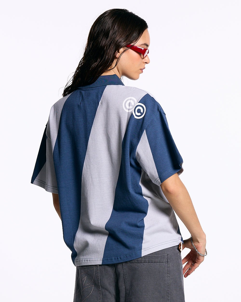 ASLANT STRIPES POLO TEE BLUE - blue and grey striped polo shirt, back view on female model - Cold Culture #woman