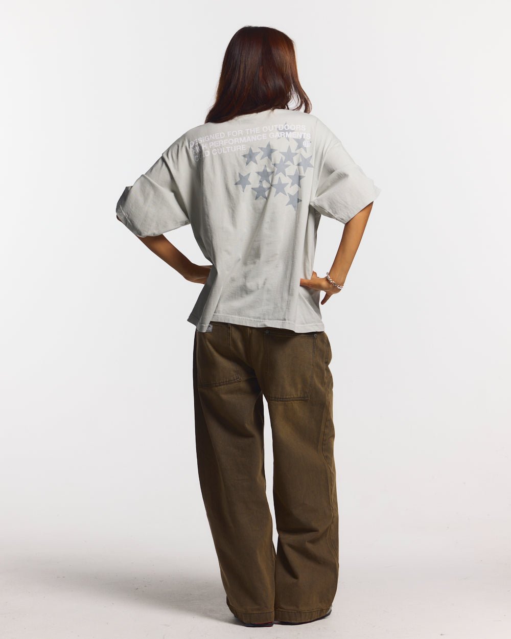 ASTRO TEE LIGHT GREY - light grey star print tee, back view on female model - Cold Culture #woman