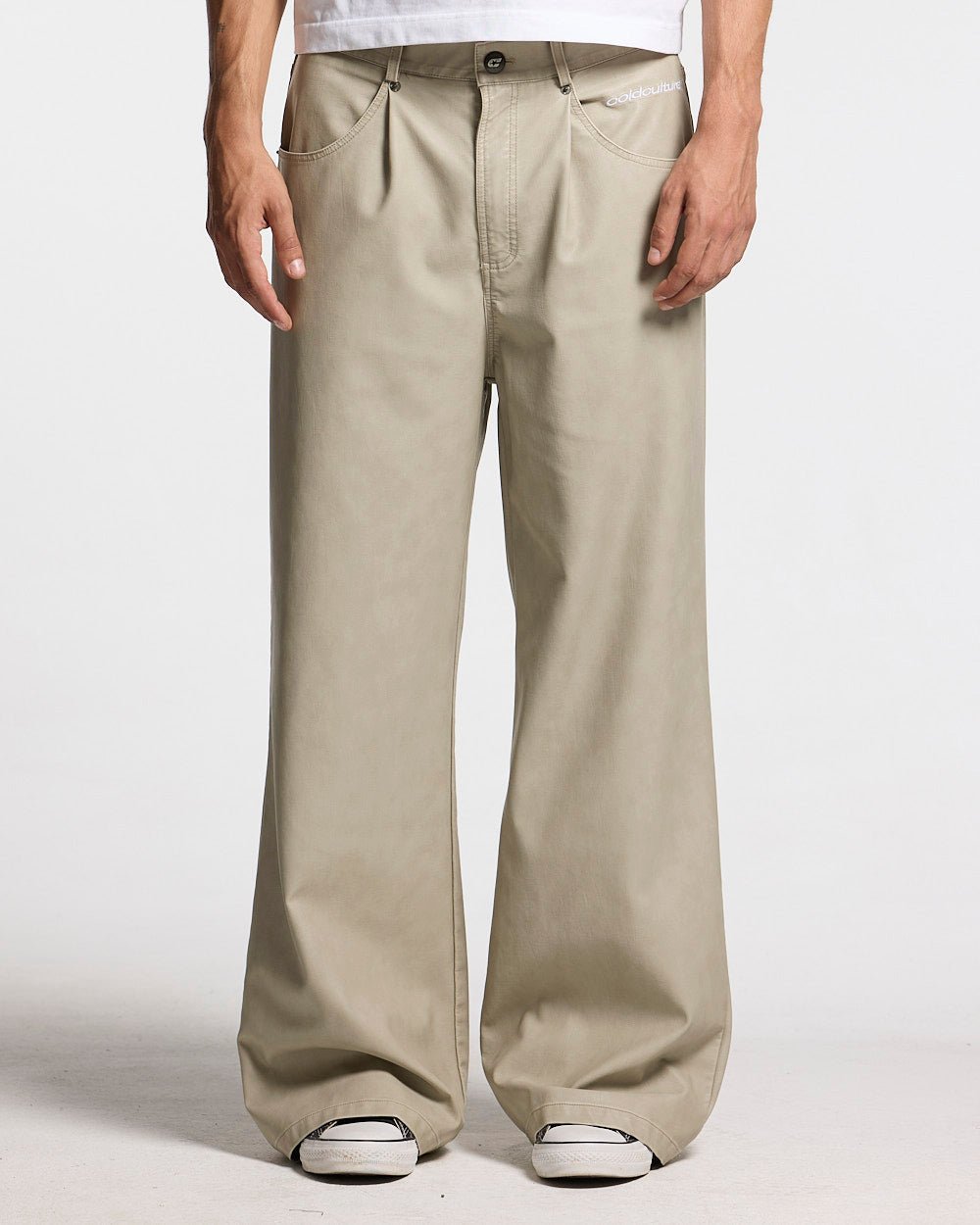 BACKTALK V3  PANTS CREAM - cream baggy pants, front view on male model - Cold Culture