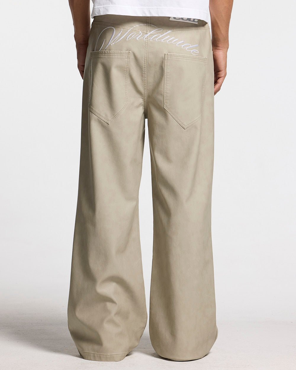 BACKTALK V3  PANTS CREAM - cream baggy pants, back view on male model - Cold Culture