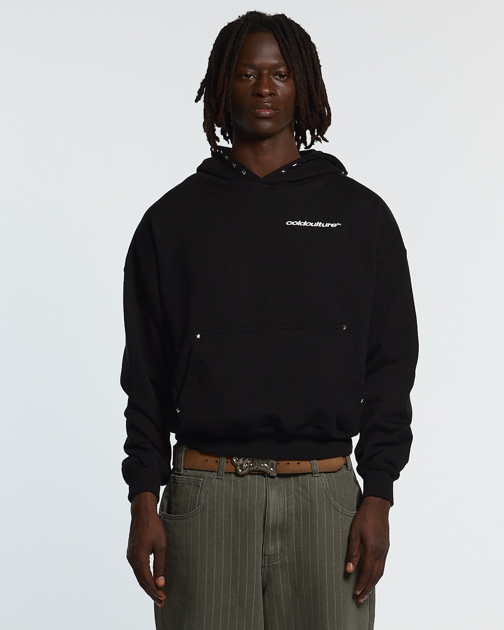 BADGES HOODIE BLACK - black studded hoodie, front view on male model - Cold Culture #man
