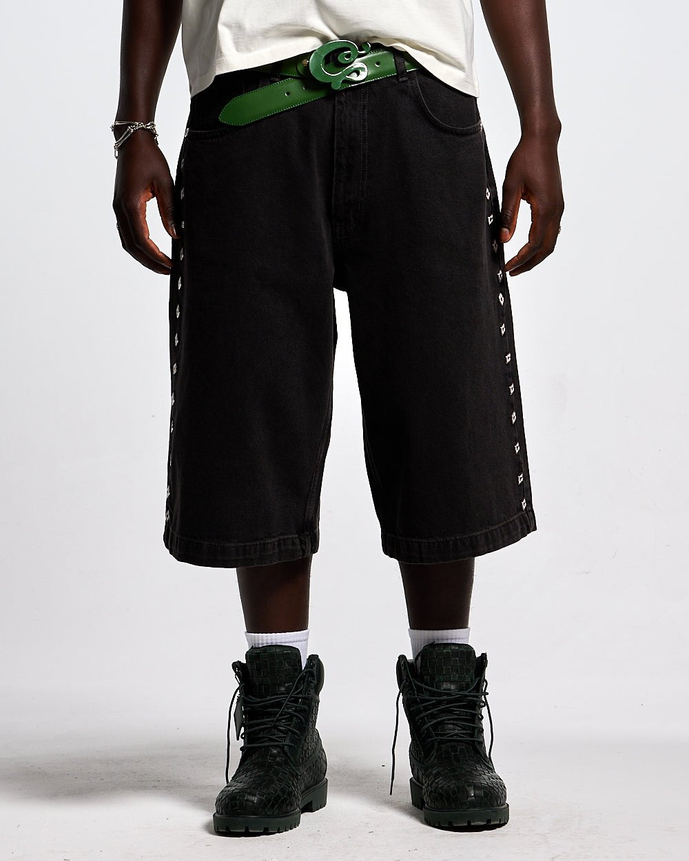BADGES JORTS BLACK LICORICE - black baggy denim shorts, front view on male model - Cold Culture