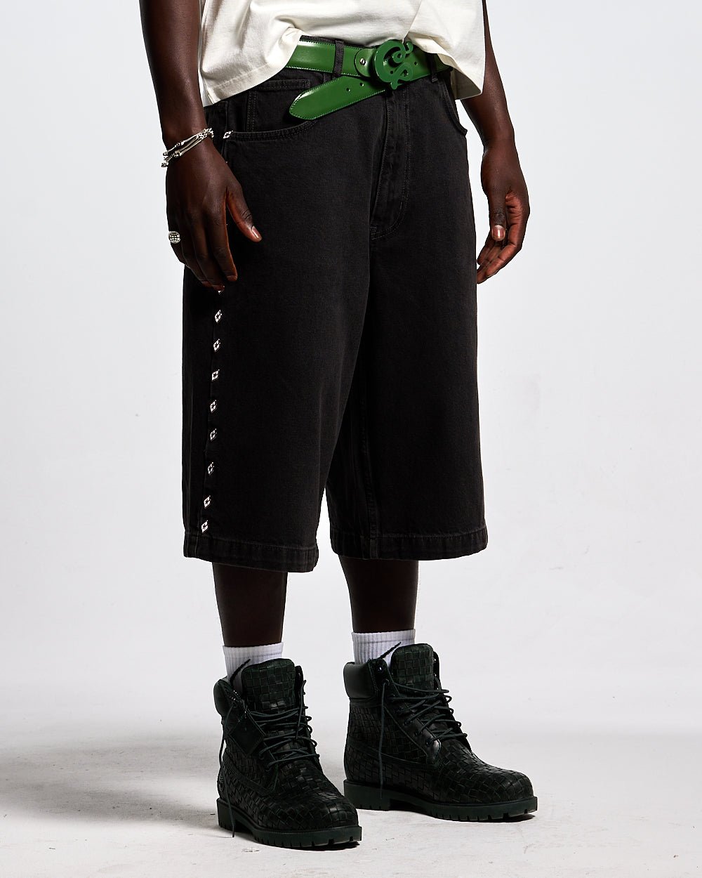 BADGES JORTS BLACK LICORICE - black baggy denim shorts, front view on male model - Cold Culture