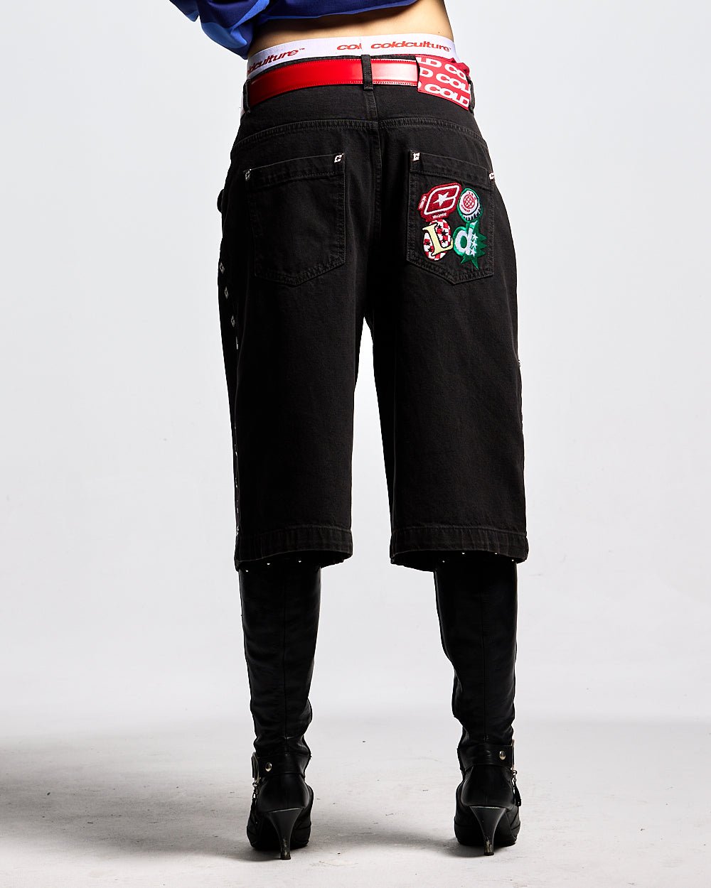 BADGES JORTS BLACK LICORICE - black baggy denim shorts, back view on female model - Cold Culture #woman