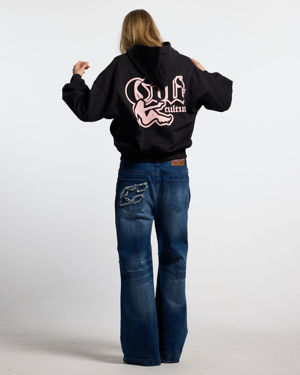 BANG BANG HOODIE BLACK - black graphic print hoodie, back view on female model - Cold Culture #woman