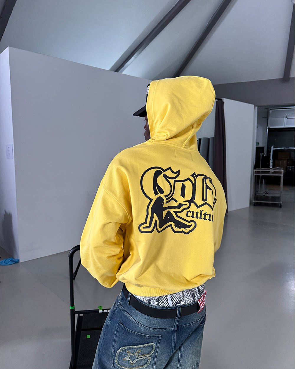BANG BANG HOODIE YELLOW - yellow graphic print hoodie, street style shot - Cold Culture
