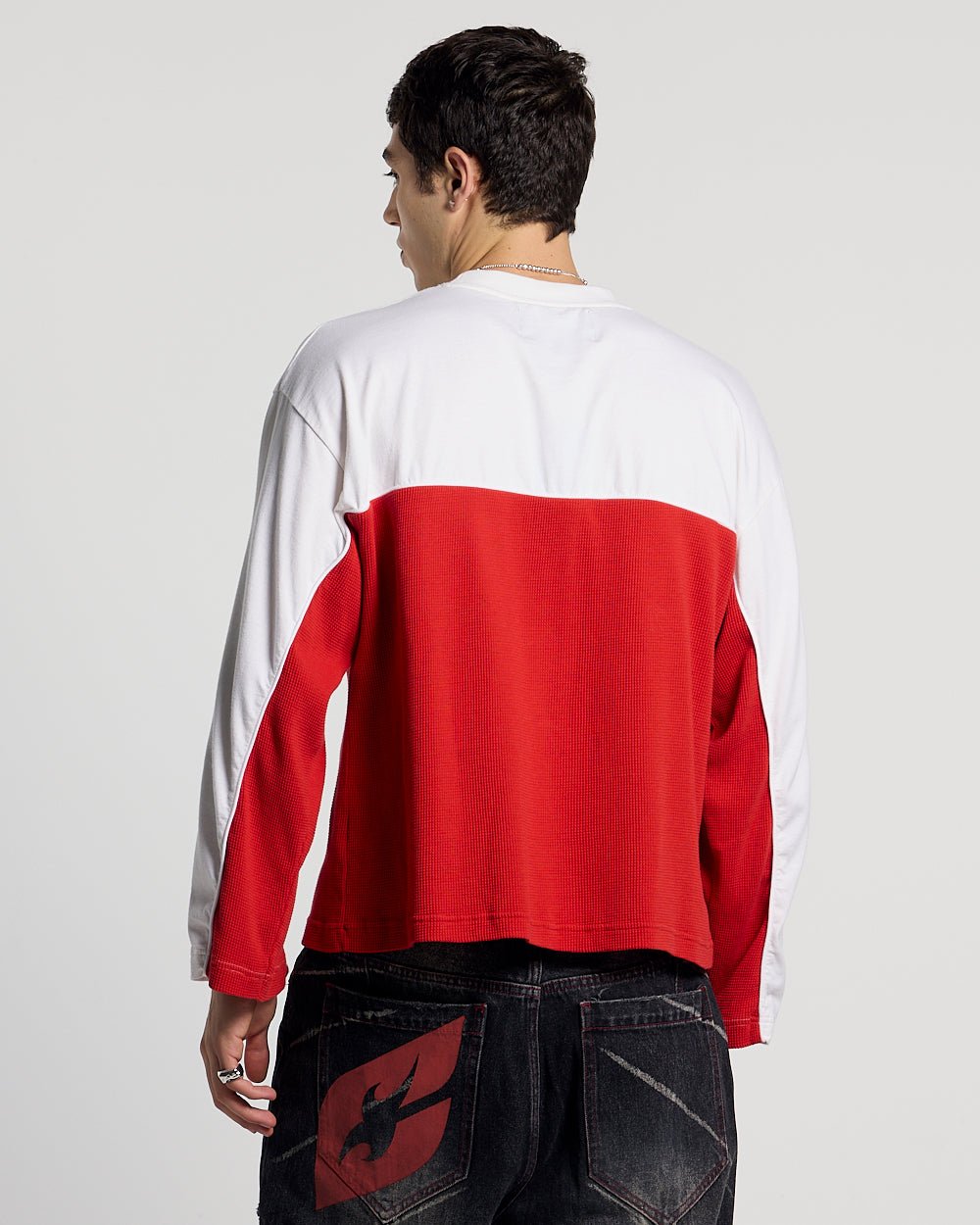 BICOLOR WAFFLE LONGSLEEVE RED & WHITE - red and white colorblock longsleeve tee, back view on male model - Cold Culture #man