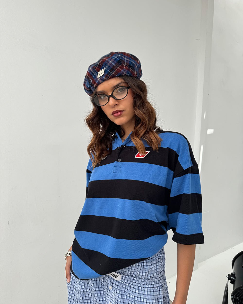 BIG STRIPES POLO T-SHIRT JASPER BLUE - blue and black striped polo shirt, front view on female model - Cold Culture #woman