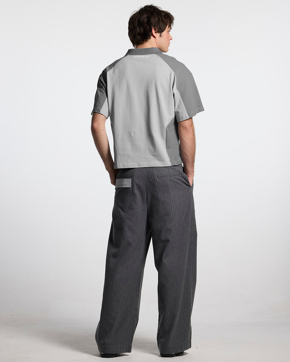 BIKER POLO LIGHT GREY - light grey half-zip polo, back view on male model - Cold Culture #man