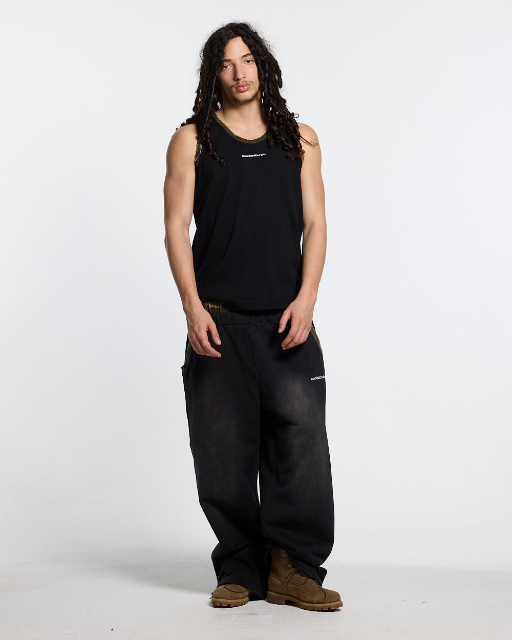BLACK OPS TANK TOP BLACK - black tank top with camo trim, front view on male model - Cold Culture #man