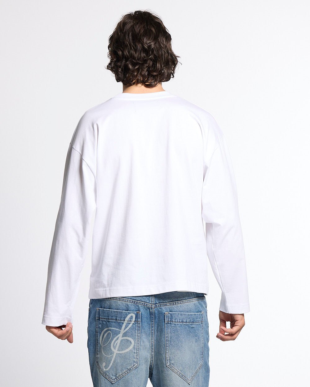 BLESSINGS LONGSLEEVE WHITE - white script print longsleeve tee, back view on male model - Cold Culture #man