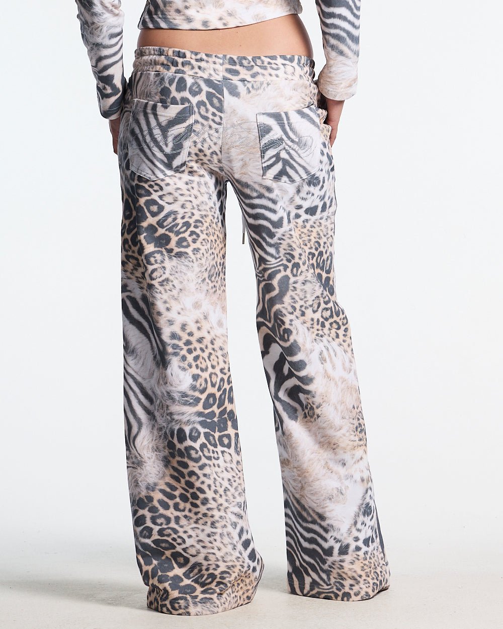 BLING SWEATPANTS LEOPARD - leopard print sweatpants, back view on female model - Cold Culture #woman