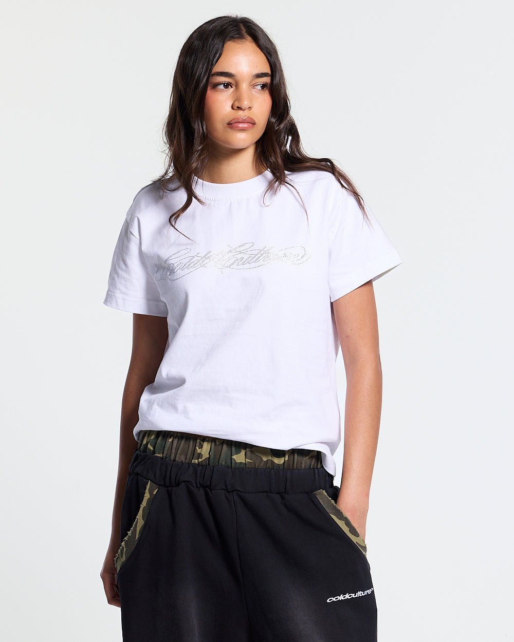 BLING TEE WHITE - white rhinestone script tee, front view on female model - Cold Culture #woman