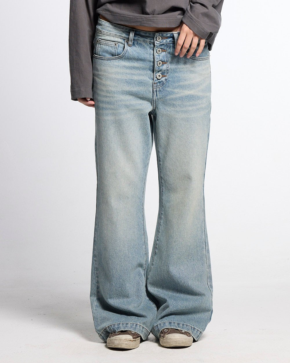 BLURRED V5 BOOTCUT PANTS LIGHT DENIM - light wash denim bootcut pants, front view on female model - Cold Culture #woman