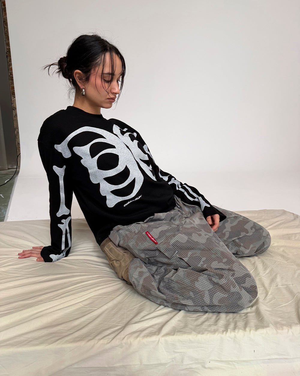 BONEY LONGSLEEVE BLACK - black skeleton print longsleeve tee, street style shot - Cold Culture #woman