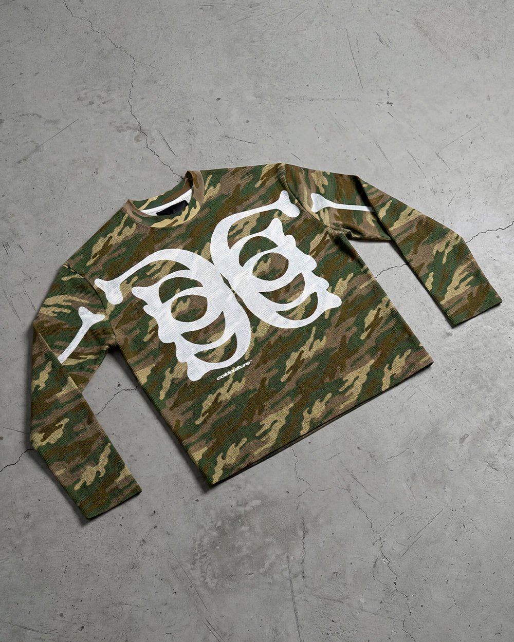 BONEY LONGSLEEVE CAMO - camo skeleton print longsleeve tee, flat lay - Cold Culture