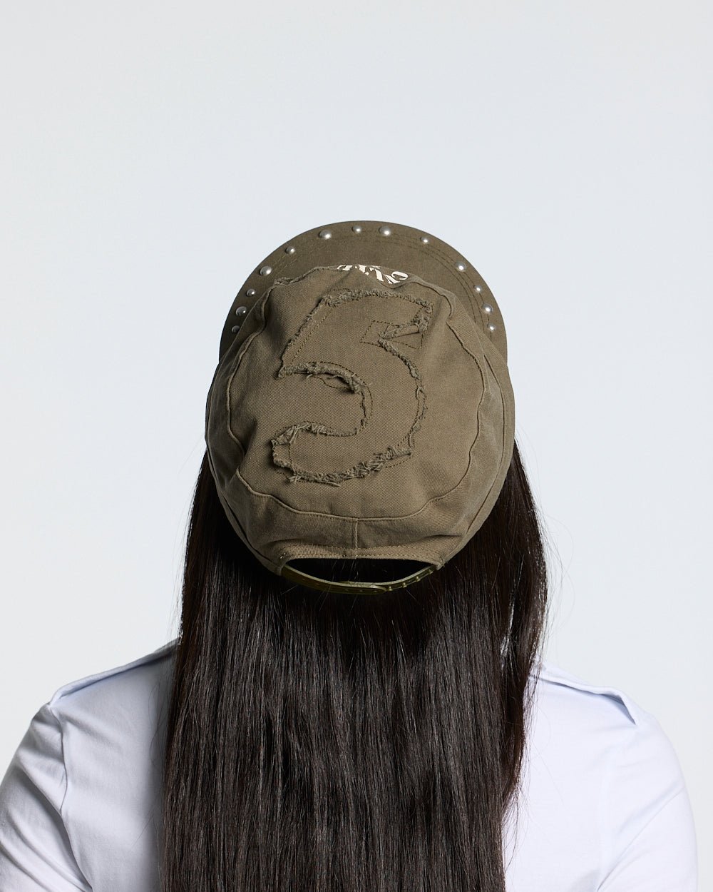 BOSSMAN CAP BROWN - brown studded cap, back view on female model - Cold Culture #woman