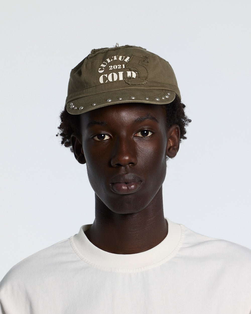 BOSSMAN CAP BROWN - brown studded cap, front view on male model - Cold Culture #man