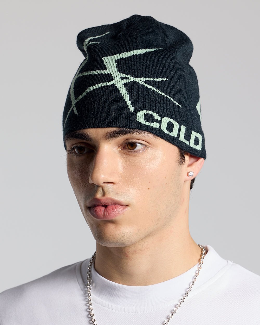 BRAMBLES BEANIE DARK BLUE - dark blue knit beanie, on model close-up - Cold Culture #man