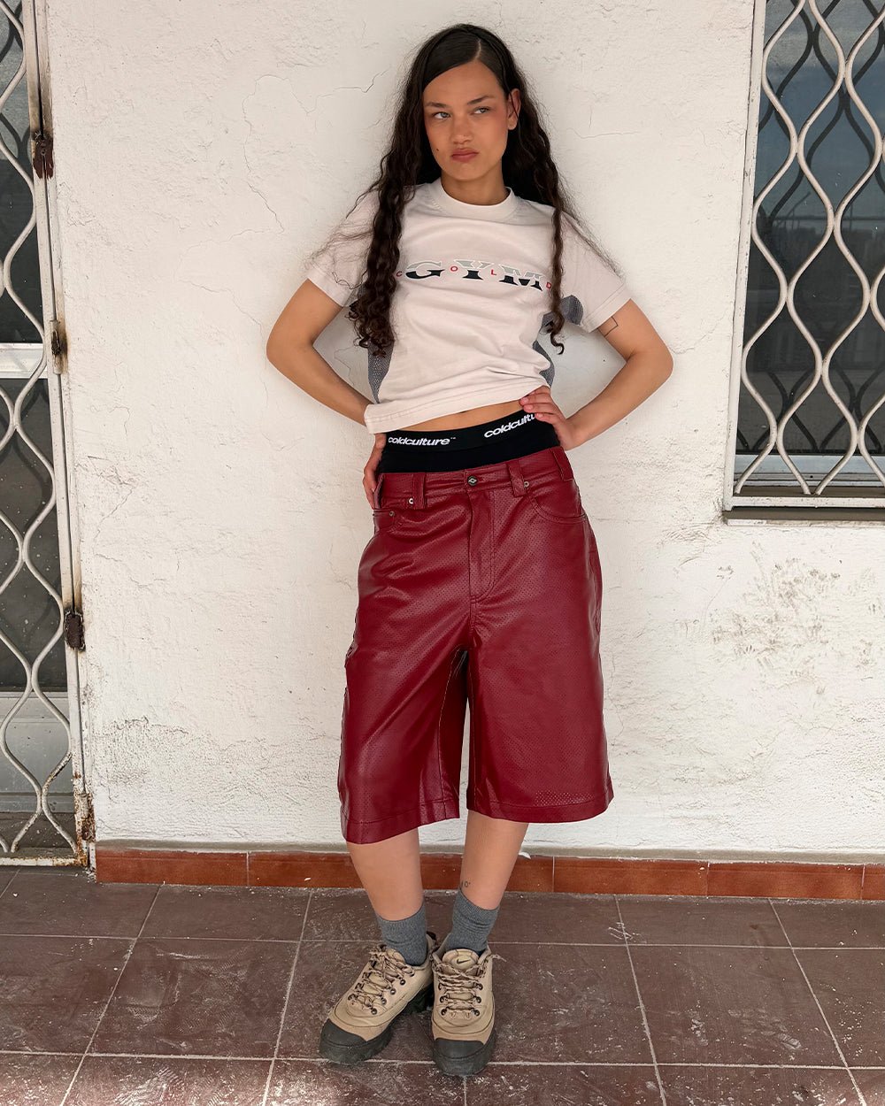 BRAVE SHORT BURGUNDY - burgundy perforated leather shorts, street style shot - Cold Culture #woman