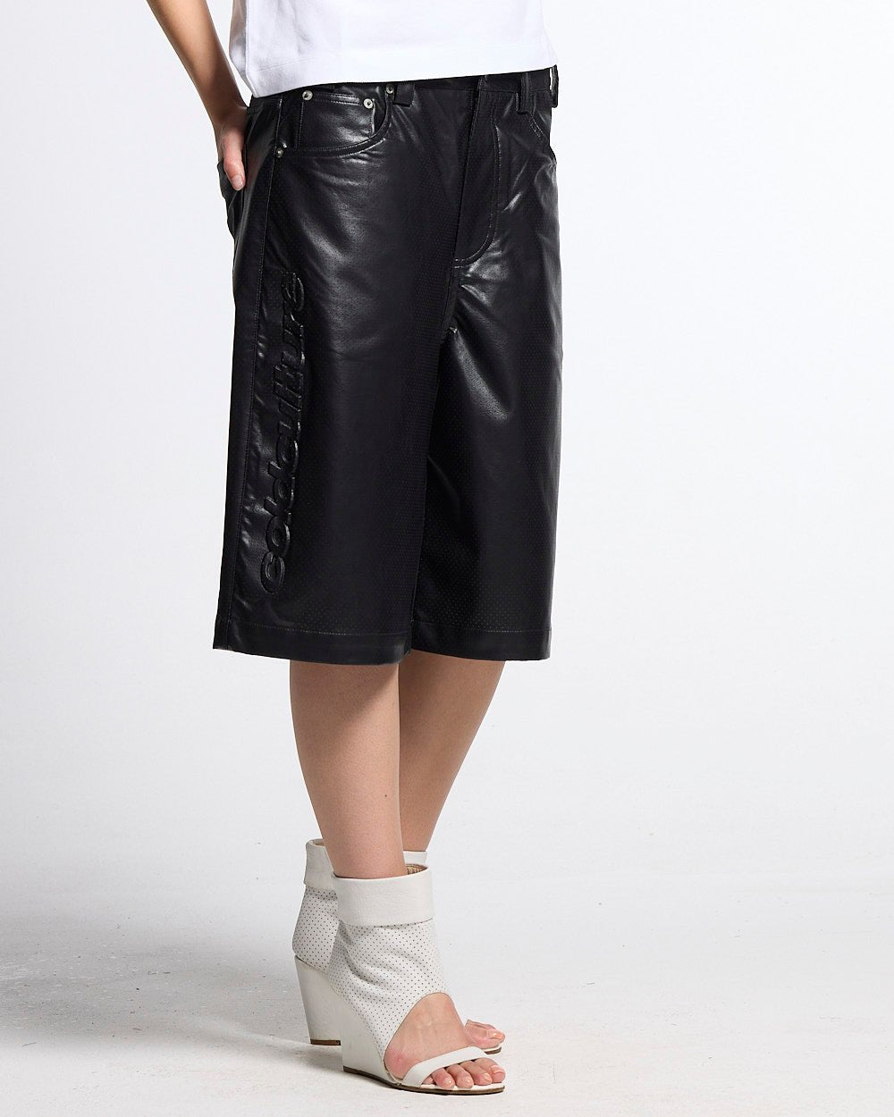 BRAVE SHORTS BLACK - black faux leather shorts, side view - Cold Culture