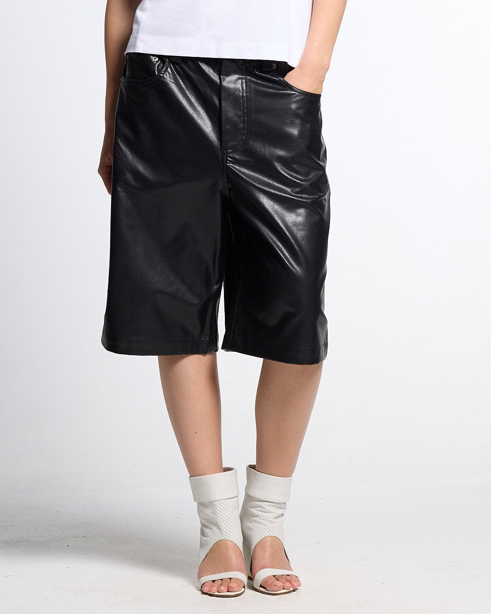 BRAVE SHORTS BLACK - black faux leather shorts, front view on female model - Cold Culture #woman