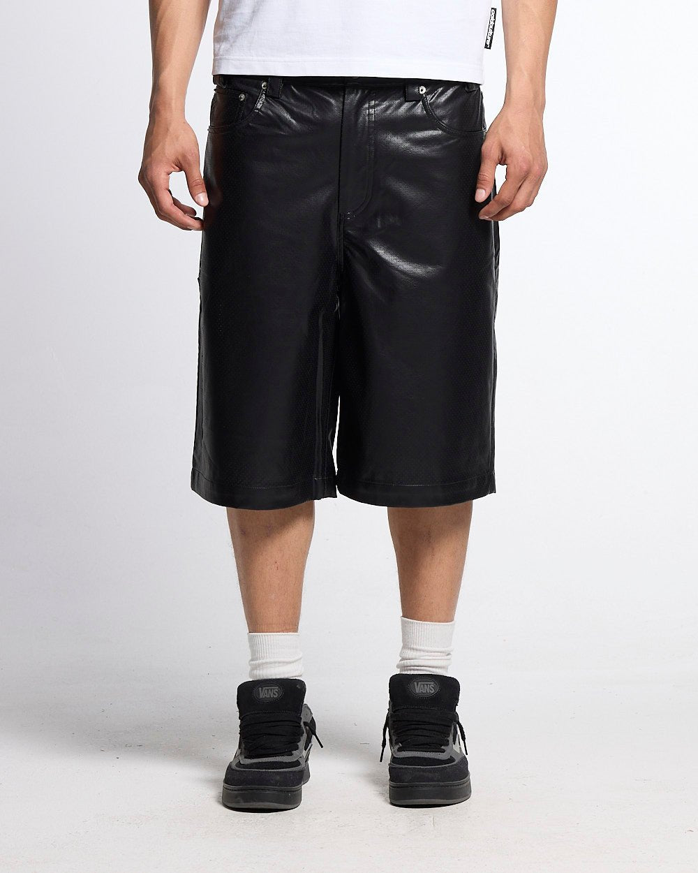 BRAVE SHORTS BLACK - black faux leather shorts, front view on male model - Cold Culture