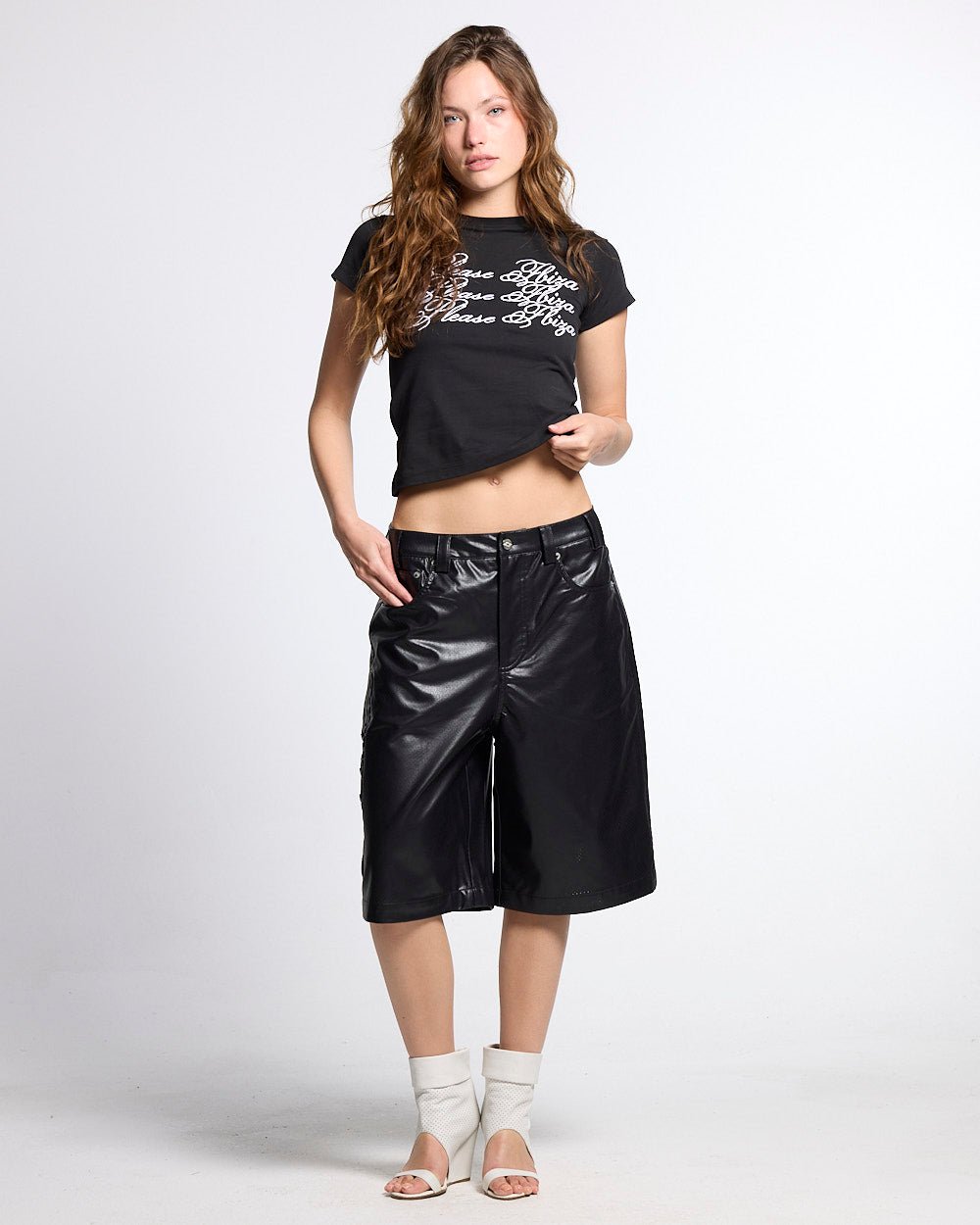 BRAVE SHORTS BLACK - black faux leather shorts, front view on female model - Cold Culture #woman