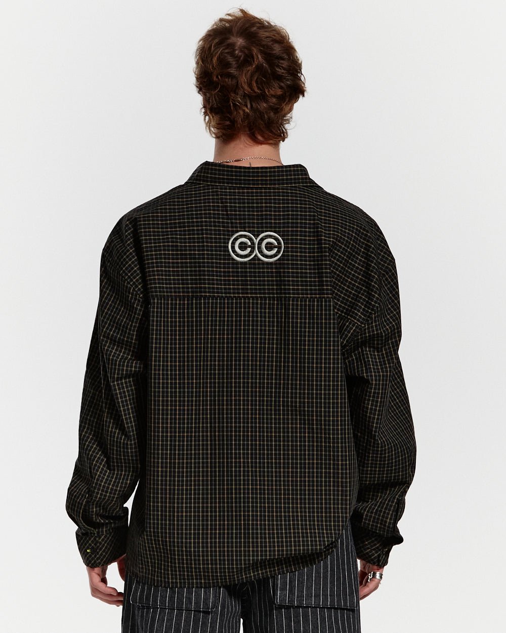 BRICK LANE SHIRT BLACK SQUARE - black checked long sleeve shirt, back view on male model - Cold Culture #man