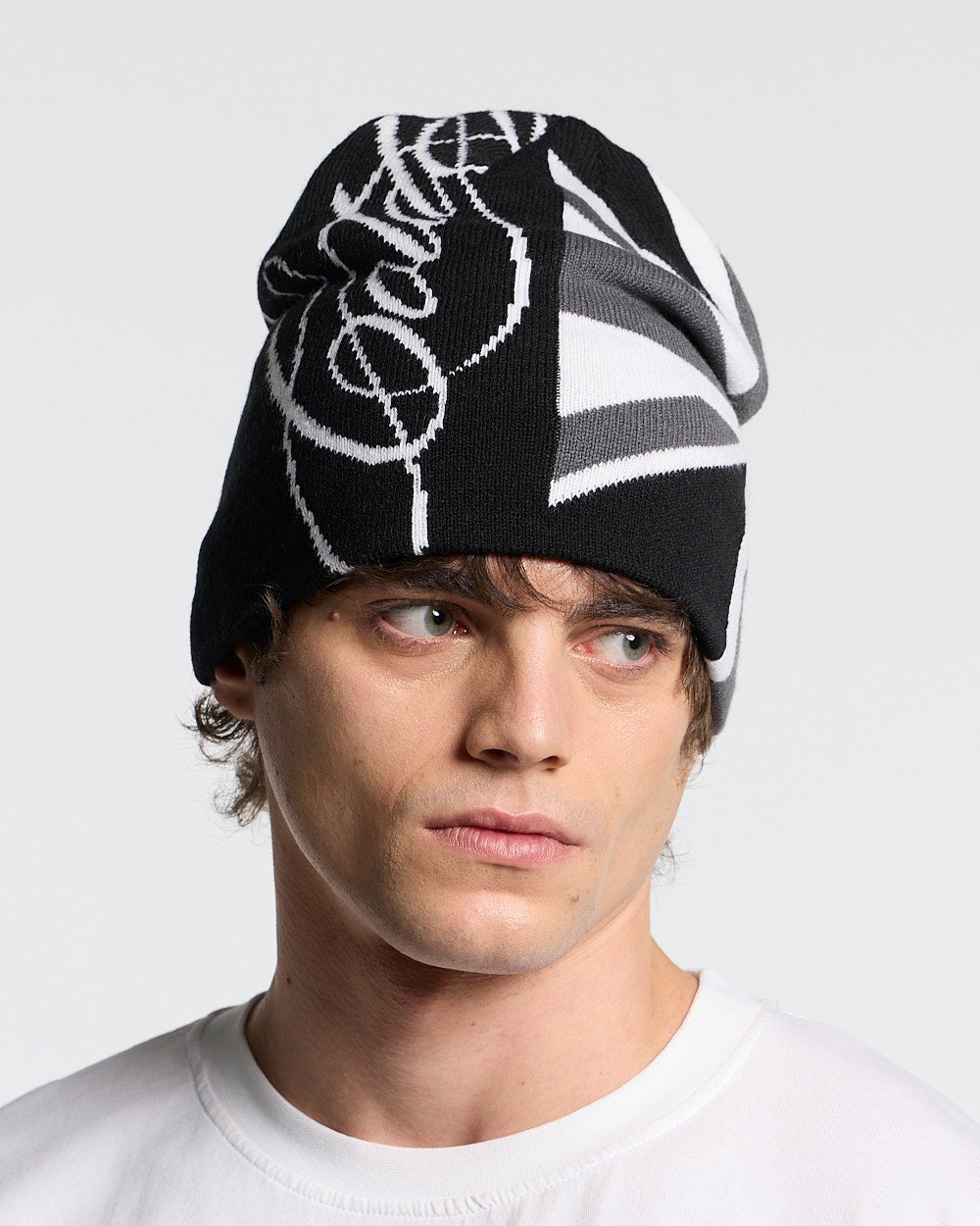 BRIGHTON BEANIE BLACK & GREY - black and grey knit beanie, on model close-up - Cold Culture #man