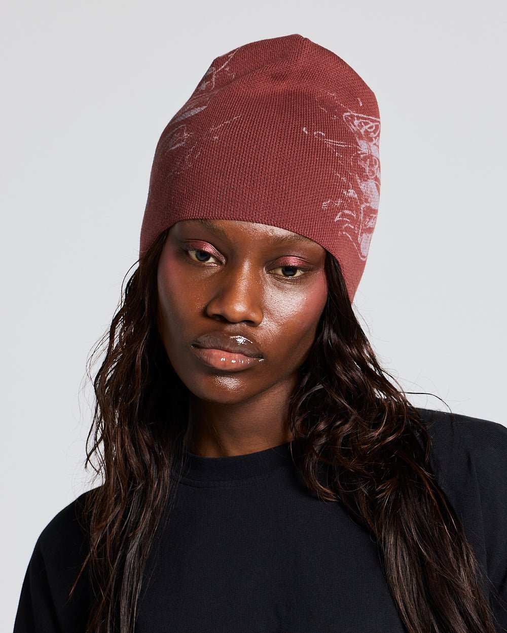 BURN ICONS BEANIE BROWN - brown graphic print beanie, on model close-up - Cold Culture #woman