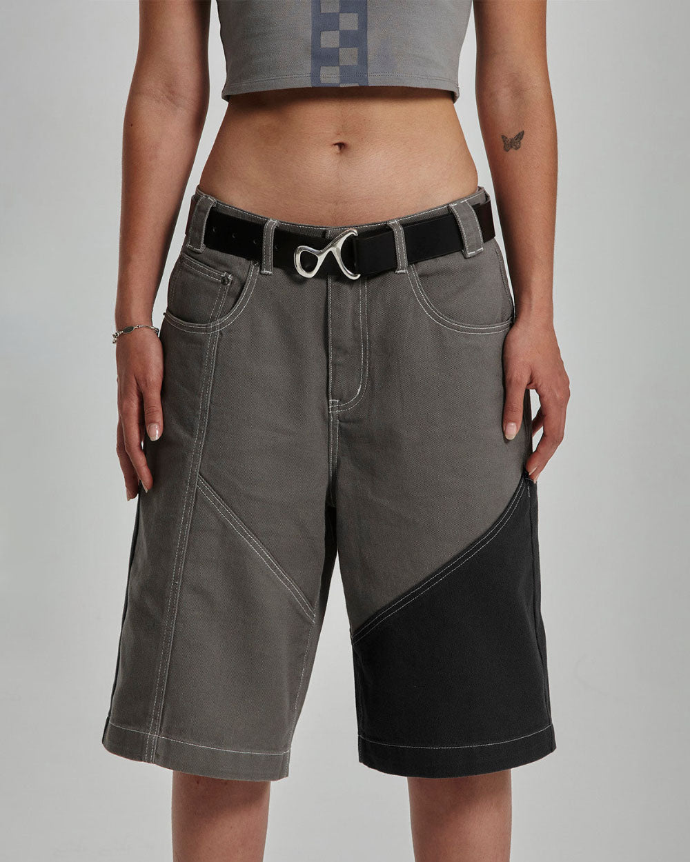 BUTTERFLY V2 SHORTS GREY/BLACK DENIM - grey black patchwork denim shorts, front view on female model - Cold Culture #woman